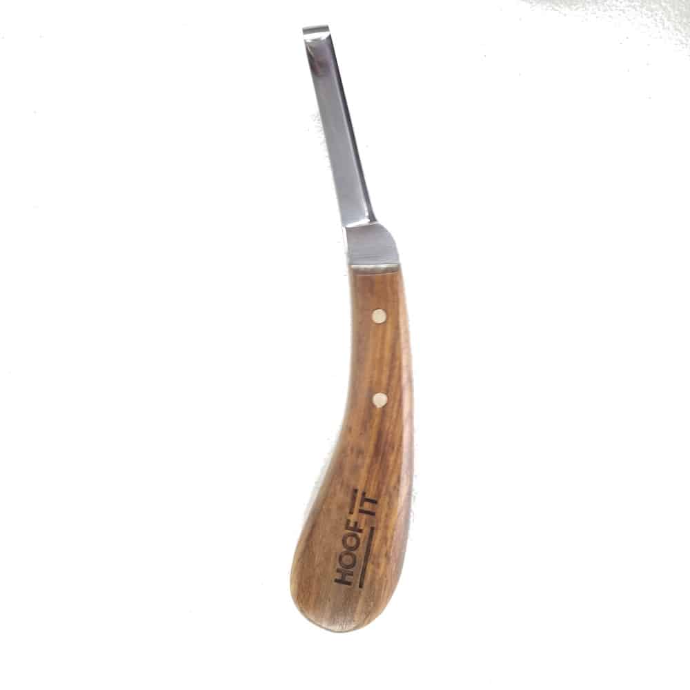 Hoof It Walnut Handle Hoof Knife – Left Hand, Narrow Blade, J2 Stainless Steel 1 Hoof It left-hand farrier hoof knife with a natural wooden handle and curved single-edge blade