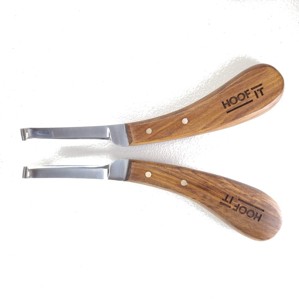 Hoof It Walnut Handle Hoof Knife – Left Hand, Narrow Blade, J2 Stainless Steel 5 Hoof It left-hand and right-hand wooden-handle hoof knives arranged as a pair, second view